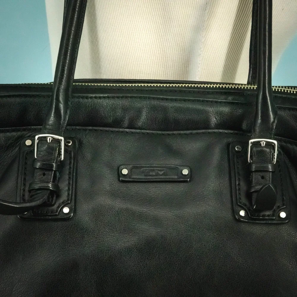 Tumi black leather